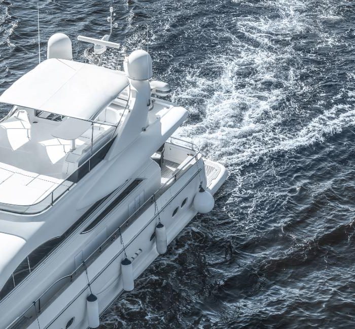 white-ship-sailing-on-blue-ocean-2022-12-16-16-16-06-utc-1.jpg